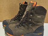 a close up of a pair of hiking boots on a table