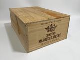 a wooden box that has a wine label on it
