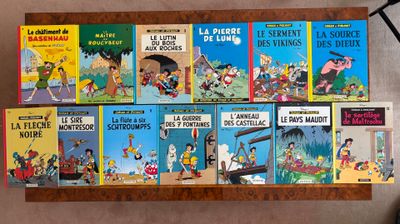 many children ' s books on a shelf on the floor
