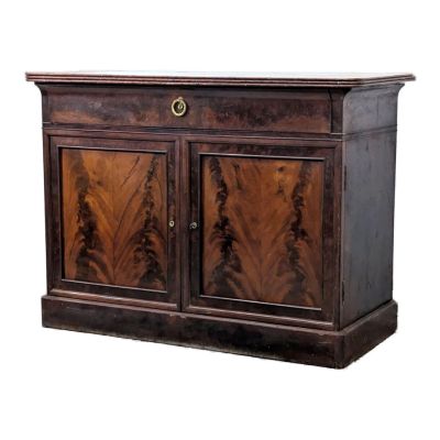 an image of a wooden cabinet with a marble top