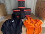 a box with a pair of knee pads on top of it