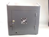 a metal safe box with a fan on top of it