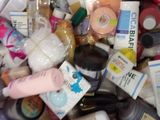 many different types of skin care products in a bin