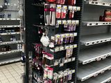 many empty shelves in the store for sale