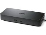 une photo d'un ordinateur portable Dell posé sur une surface blanche
