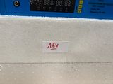 an image of a gas pump with a sign on it