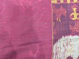 a close up of a piece of cloth with a picture of a horse on it