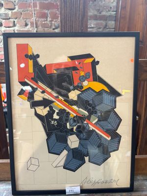 framed artwork of a city map with a red and yellow arrow