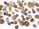 a lot of coins that are on the table