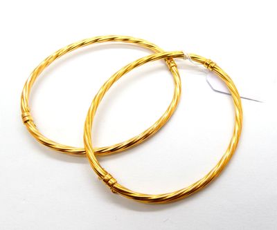 Paire de bracelets rigides en or jaune 750 °/°° (18k) torsad… - Photo 1