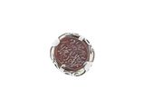 une image représentant une bague en argent sur laquelle est apposé un cachet de cire rouge