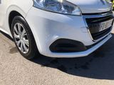 a white car parked on the side of the road