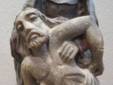 a statue of a man holding a woman in his arms