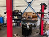 a picture of a garage with a lot of tools in it