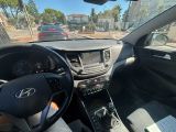 the interior of a car with a steering wheel and dashboard