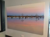 a picture of a painting hanging on a wall in a room