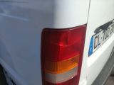 a close up of a rear end of a white van