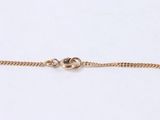 a gold chain bracelet with a clasp on a white background