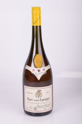 an image of a bottle of wine sitting on top of a table
