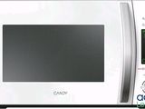 une image d'un four à micro-ondes blanc sur fond blanc