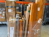 many boxes stacked on a pallet in a warehouse