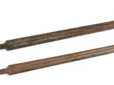 pair of old iron tools on a white background