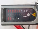 a close up of a meter with wires and wires
