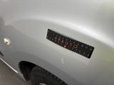 a close up of a car with a sticker on it