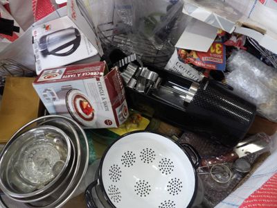 many items in a bag that are sitting on a table