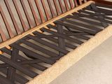 an image of a bench made out of wood and wicker