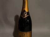 a close up of a bottle of champagne on a white background