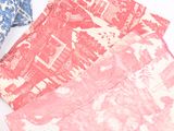 several pieces of fabric are laid out on a white surface