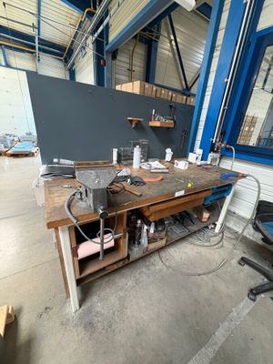 an image of a workbench in a warehouse