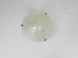 an image of a glass light fixture on a white wall