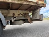 a truck that is parked on the side of the road