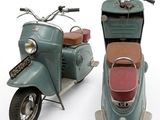 two scooters sitting side by side on a white surface