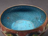 a close up of a colorful bowl on a table