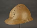 a helmet that is sitting on a metal stand