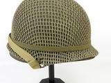 an image of a helmet on a stand on a white background