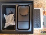 a box with a remote control and other items in it