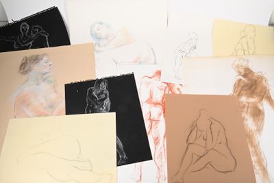 many different types of drawings on a table