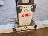 a close up of a metal pole with a sign on it