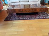 a living room with a couch and a coffee table