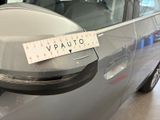 a sticker on the side mirror of a car with a sticker on it