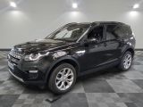 a picture of a black land rover parked on a checkered floor