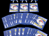 a lot of pokemon cards on a black background