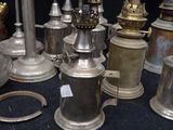 many different types of bells on display on a table