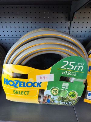 many different types of garden hoses on the shelf
