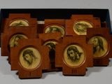 six wooden coasters with pictures of jesus and other religious figures