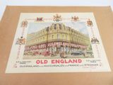 la photo d'une vieille carte postale d'Angleterre posée sur une table